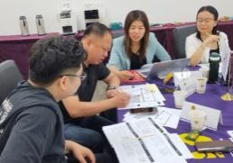 EMBA students working on an assignment